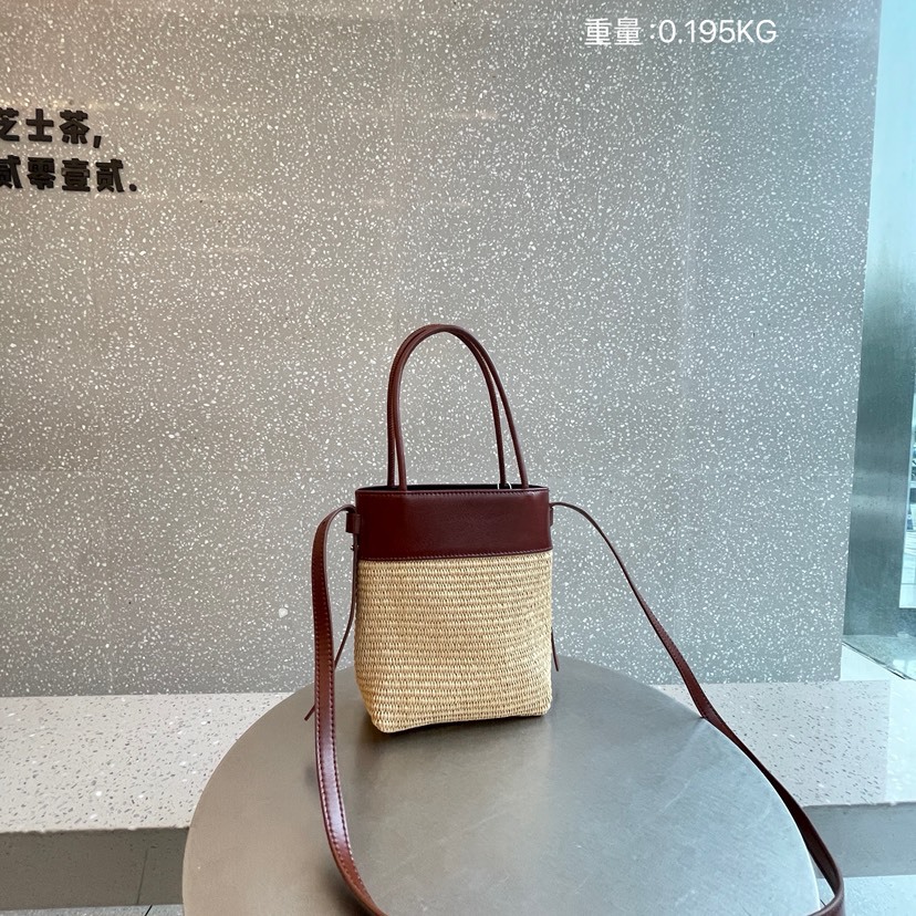 2025新款编织包女拉菲草编斜挎包包时尚百搭撞色手机沙滩包水桶包