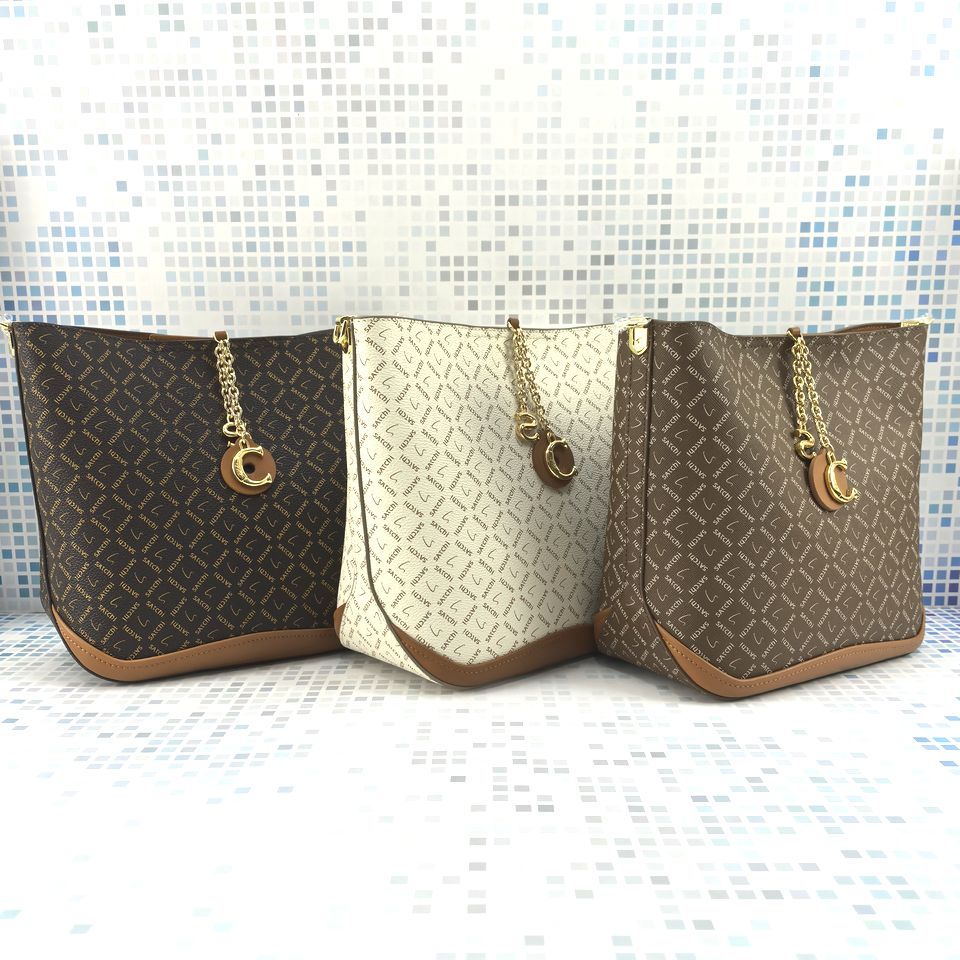 25沙驰女包经典水桶包单肩斜挎包