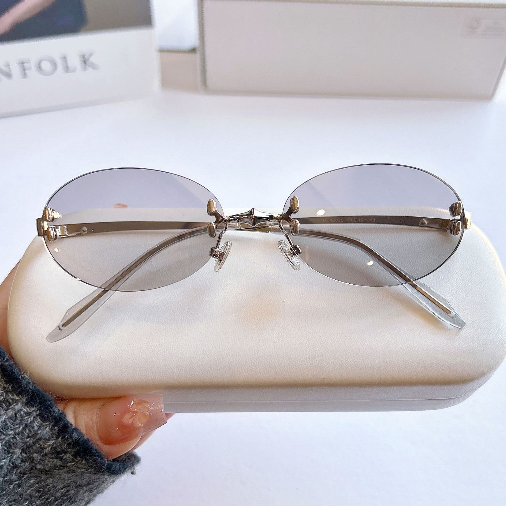 韩版椭圆形无框防晒小框太阳镜高级感个性防蓝光平光装饰素颜眼镜