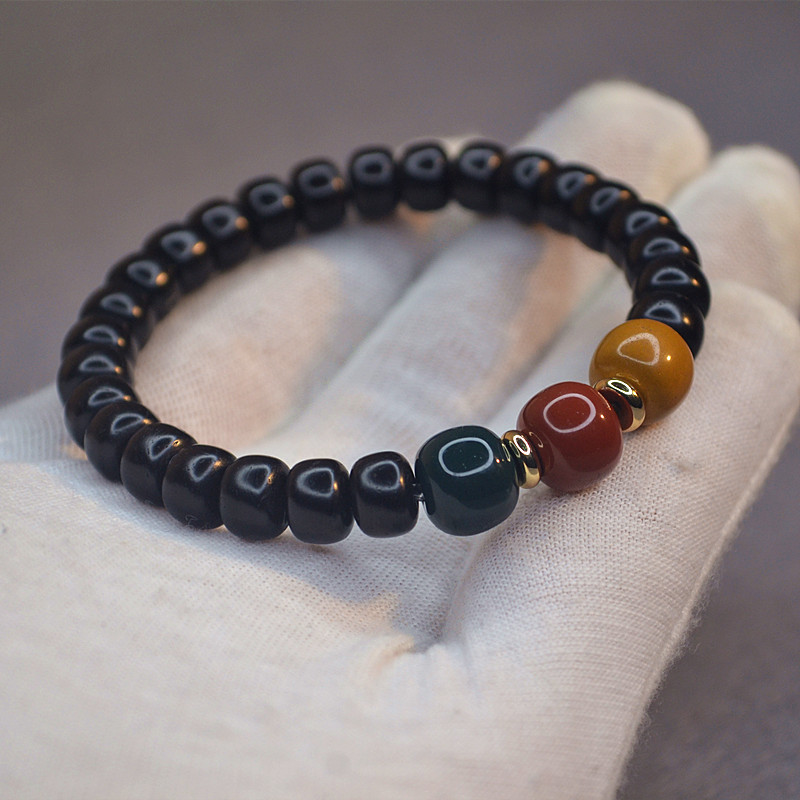 高密黑料椰蒂南瓜珠手串椰蒂百香籽桶珠红绿灯佛珠单圈盘玩手把件