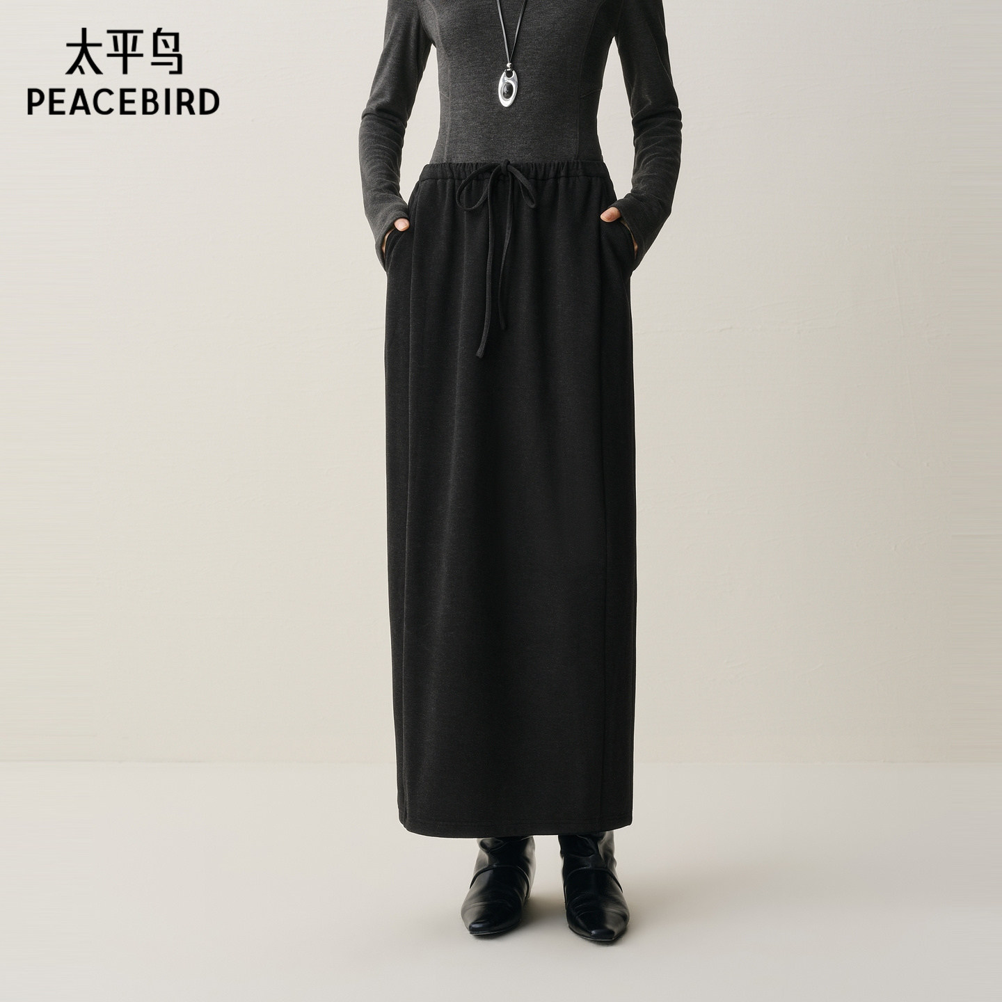 太平鸟黑色时尚气球裙女长裙2025年新款高级感针织品质半身裙女