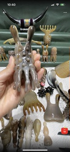 特价出（有角心扣）牛角海参长腿按摩梳