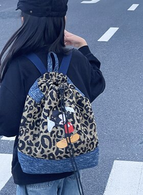 新款儿童背包幼儿园卡通可爱宝宝小书包韩版豹纹抽绳出游双肩包潮