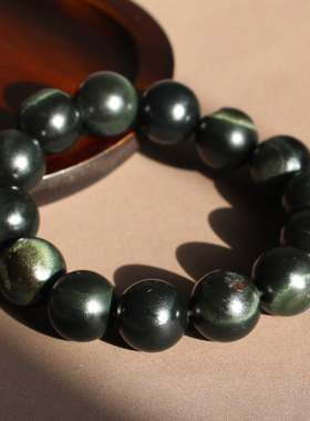 新疆籽料留皮孔塔青16mm圆珠手串