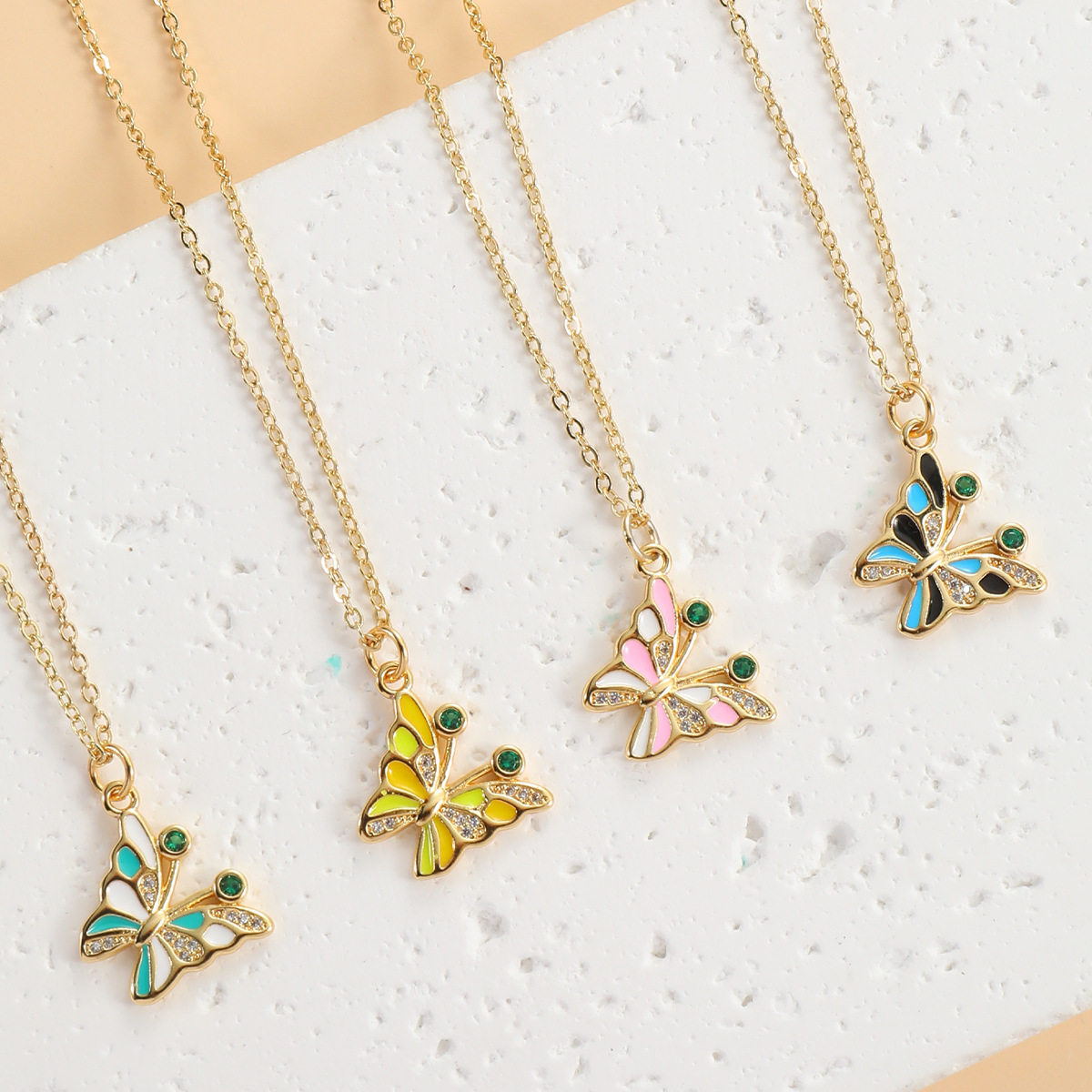 欧美创意新款创意小众铜镀金镶彩锆吊坠彩色滴油蝴蝶项链女Temu现