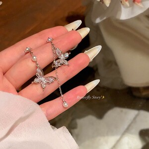 蝴蝶锆石流苏珍珠耳环女2024新款爆款不对称耳坠轻奢高级感耳钉潮