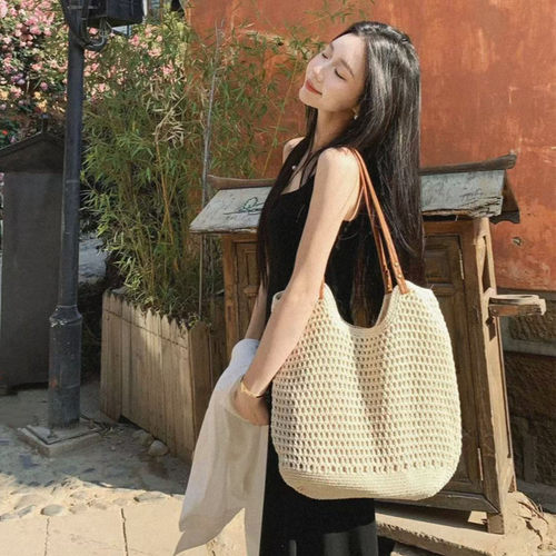 度假慵懒风棉线编织镂空草编包包