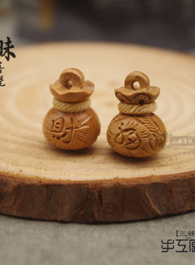 diy钱袋红绳手编配饰桃木雕刻
