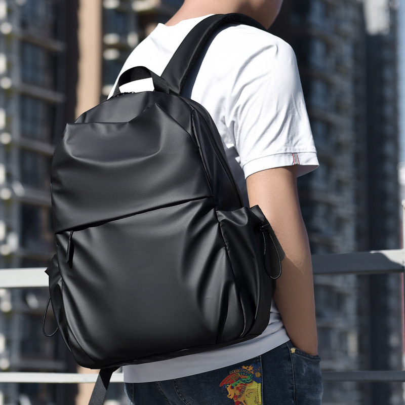 夏季新款时尚潮流包商务包双肩包男休闲包大容量双肩背包学生