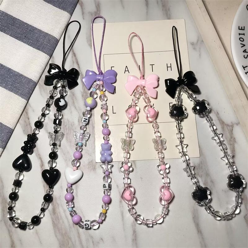 新款黑蝴蝶结爱心珠子手机链