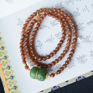 一斤钻戒 天然和田糖玉手链项链 玉质油润细腻 18K金碧玉莲花珠