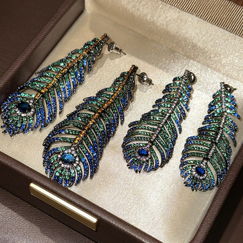 富丽堂皇孔雀绿宝石羽毛流苏耳环轻奢高级感耳钉时尚气质锆石耳饰