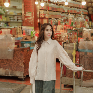 QUEENSHOP 2026春夏新品女装抓皱澎袖透肤剪接长袖衬衫01025735