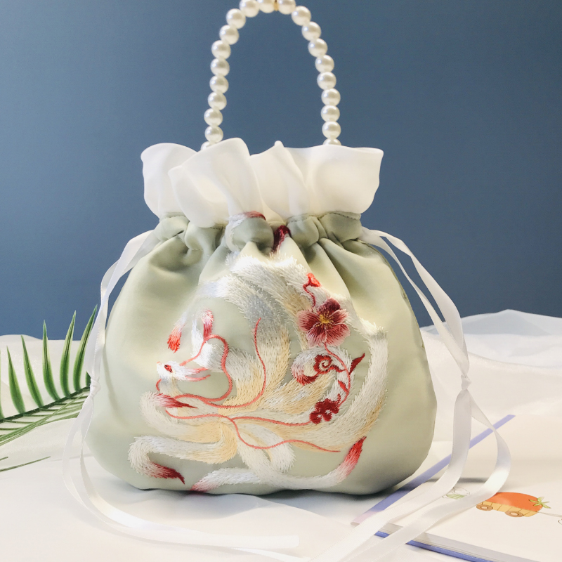 云之琪抽绳手提斜挎苏绣汉服包