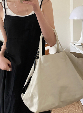 NSS 早春新款吊带连衣裙女不规则宽松显瘦百搭长裙