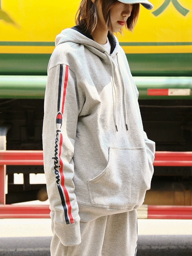 Чемпион капюшона, чемпион, трава, пишет большой C -печатный нейтральный ветер и бархатный свитер мужчины и женщины