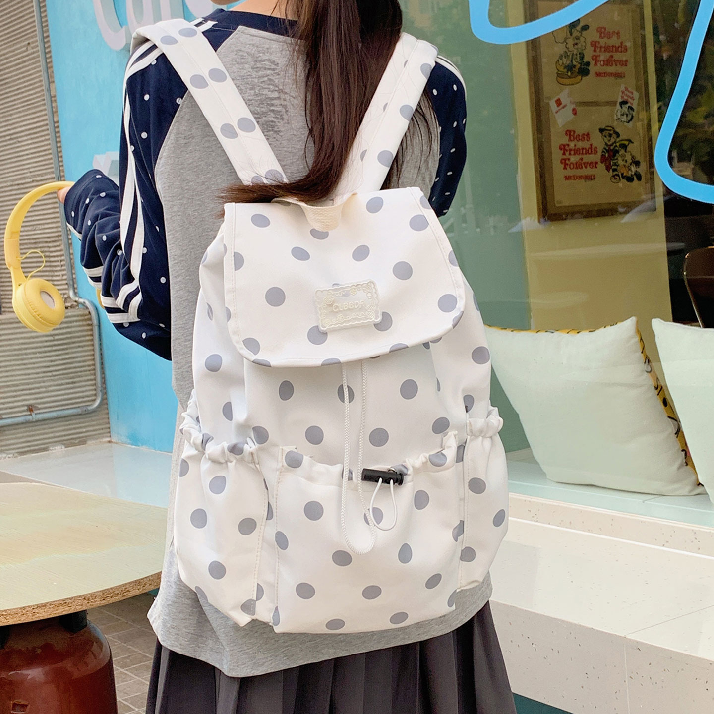 日系波点抽绳双肩包女学生上课