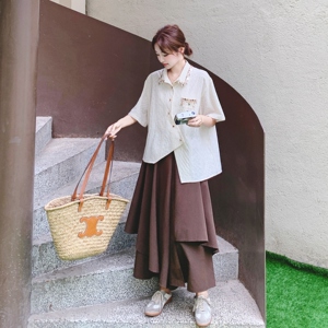 小众设计不规则刺绣衬衫套装女夏新款温柔风显瘦别致半身裙两件套图片