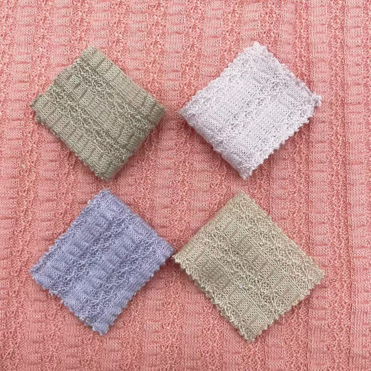 340g网格粗针提花涤纶针织布螺纹弹力透气抽条罗纹坑条针织面料