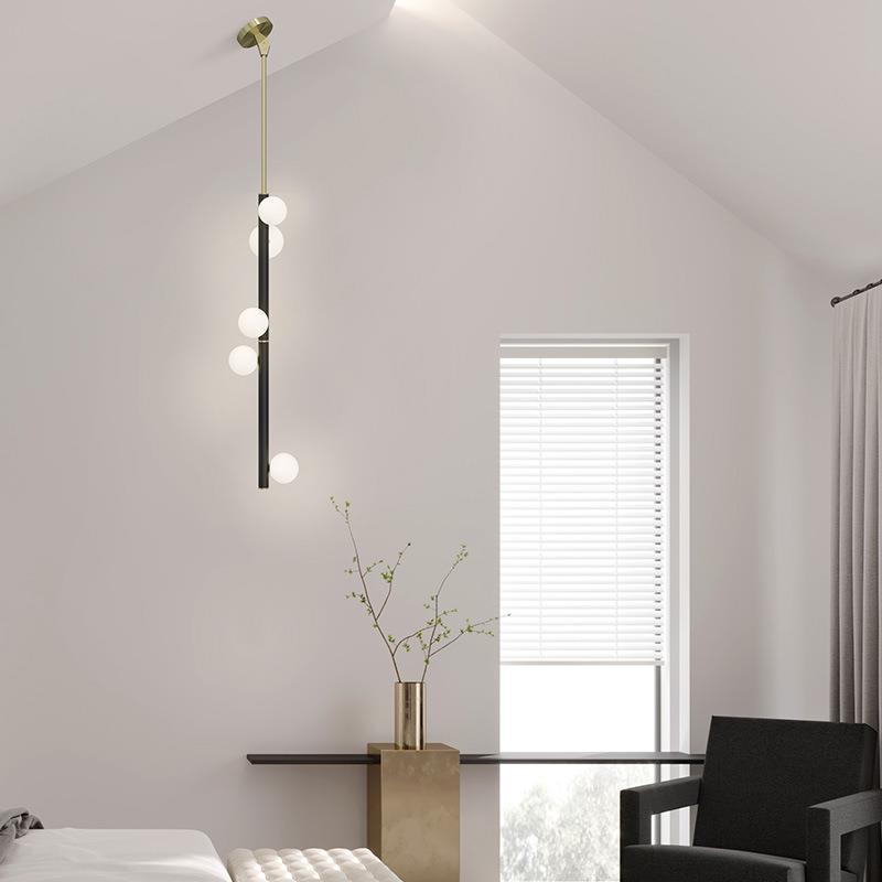 热销斜杆楼梯间灯长吊灯轻奢现代简约钢顶舞创意别墅复式楼梯吊灯