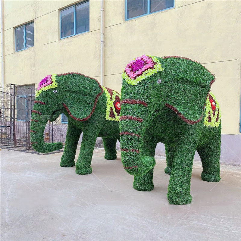 2022春节绿雕景观造型小品设计工艺品节庆绿植物动物稻草仿真大象