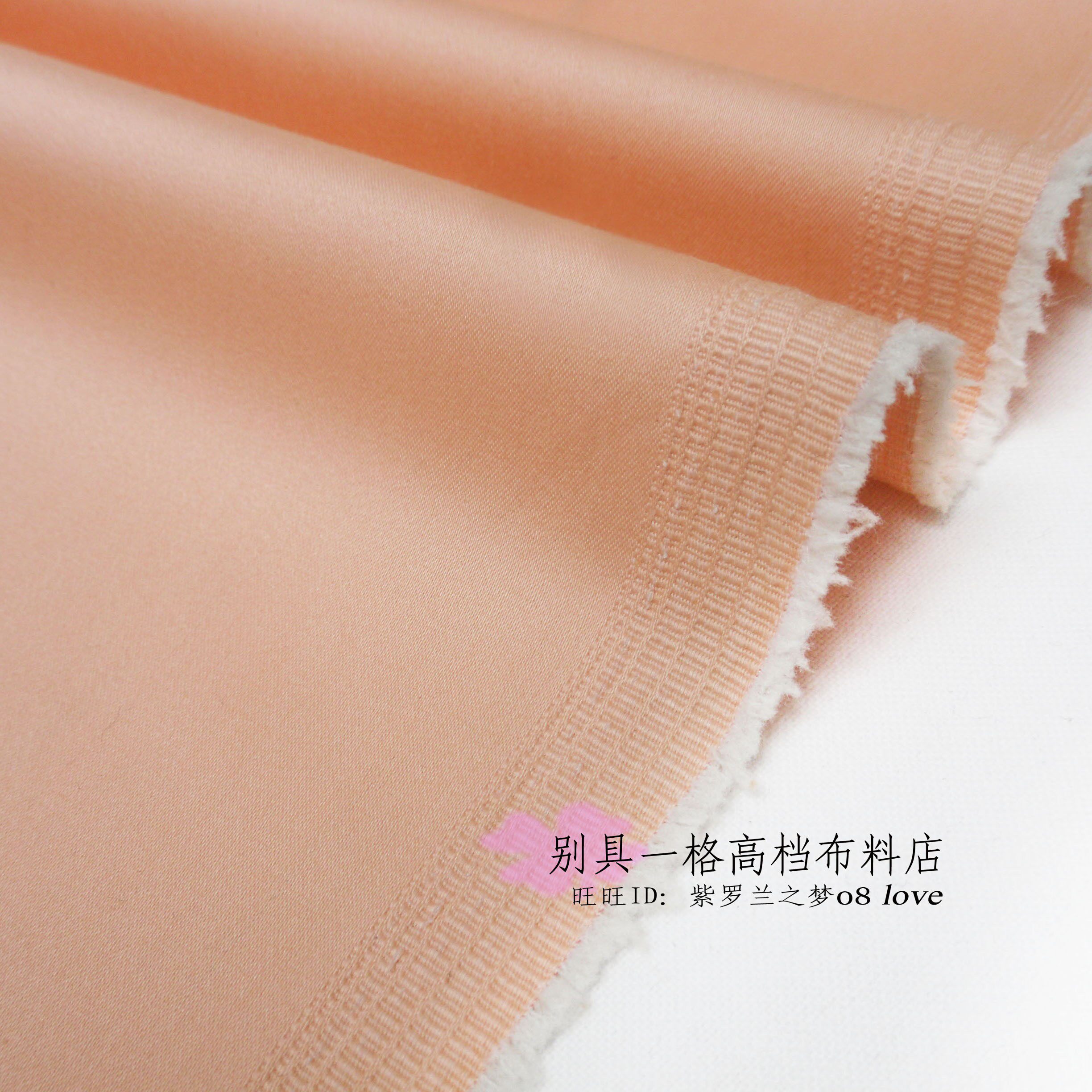 J-976春夏新款外贸布料涤棉弹力贡缎浅橘粉色西服风衣连衣裙面料