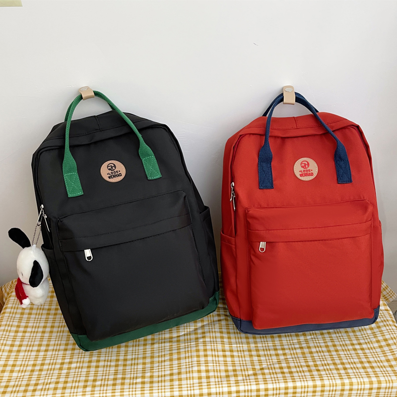 儿童书包男女学生手提背包防水