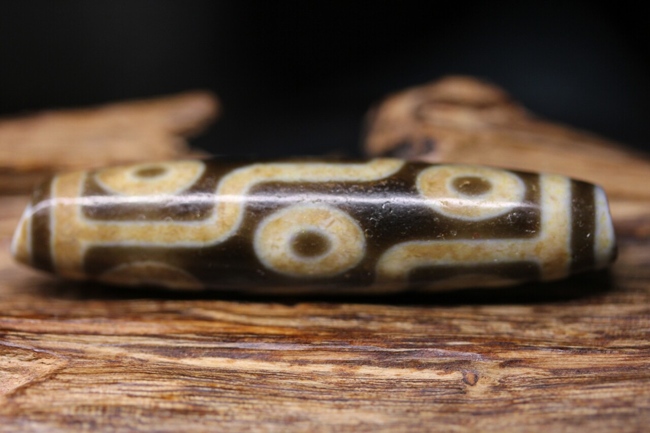 台高油牙黄手工款九眼天珠