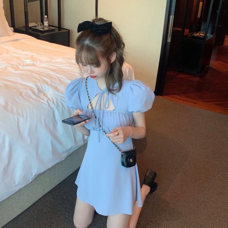 2021 new French retro care machine skirt super fairy forest cut out lace up bubble sleeve dress