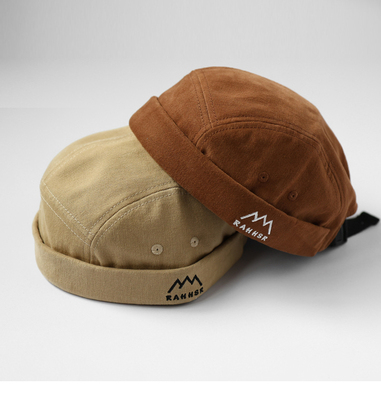 瓜皮帽街头男女一年四季无檐