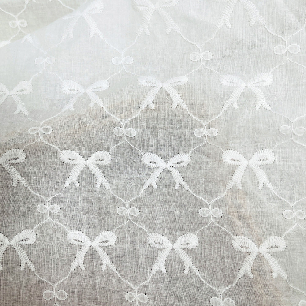 爆款蝴蝶结全棉刺绣蕾丝布料 纯白ins风连衣裙无打孔不镂空绣花布,纺织面料/辅料/配套,面料/布类,淘宝优惠券,粉丝福利购,淘宝优惠卷
