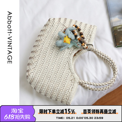 牛皮编织手提斜挎度假包菜篮包