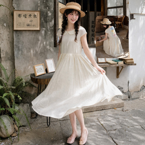 森女部落甜美杏色短袖连衣裙女2026新款夏季娃娃领显瘦垂坠感长裙