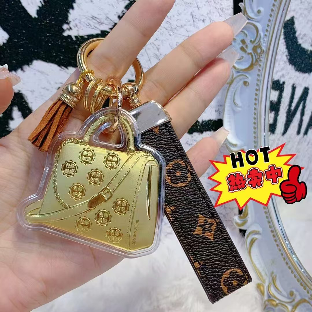 足金999手机包挂件黄金转运钥匙