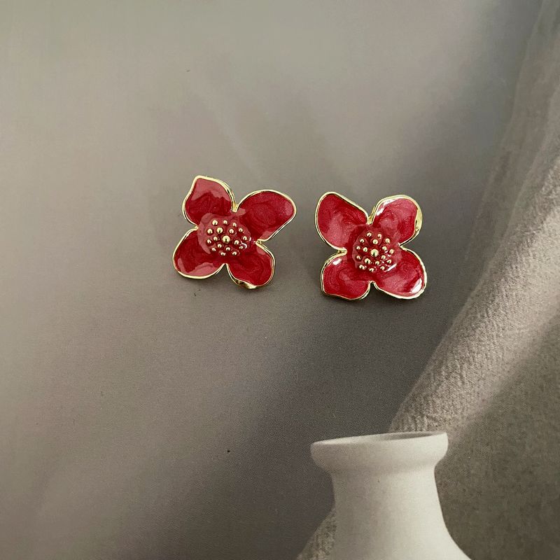 s45新潮款时尚唯美秀气珐琅滴釉花朵百搭田园风925银针耳钉耳饰品