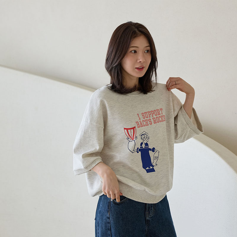 韩国东大门女装春季简约宽松休闲卫衣别致卡通印花溜肩七分袖T恤
