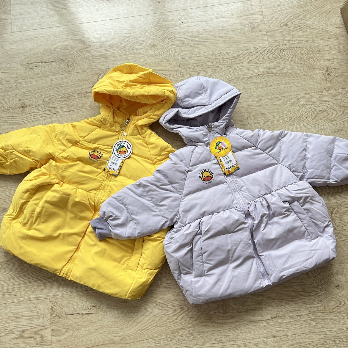 小黄鸭宽松版连帽蝙蝠裙摆外套羽羽绒服