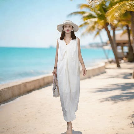 假日风连衣裙女2026夏季新款杏白色天丝扭结宽松连衣裙