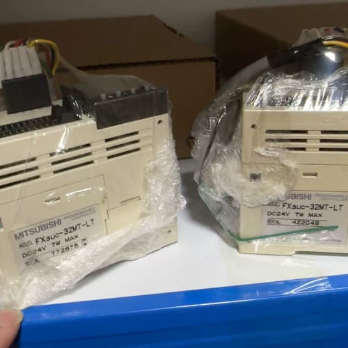 三菱+fx3uc-32mt-lt拆机货源,功能包好,成色如图--议价商品