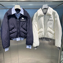 深圳南油高端女装2025冬季新款设计师款拼接深蓝短款羽绒服外套女