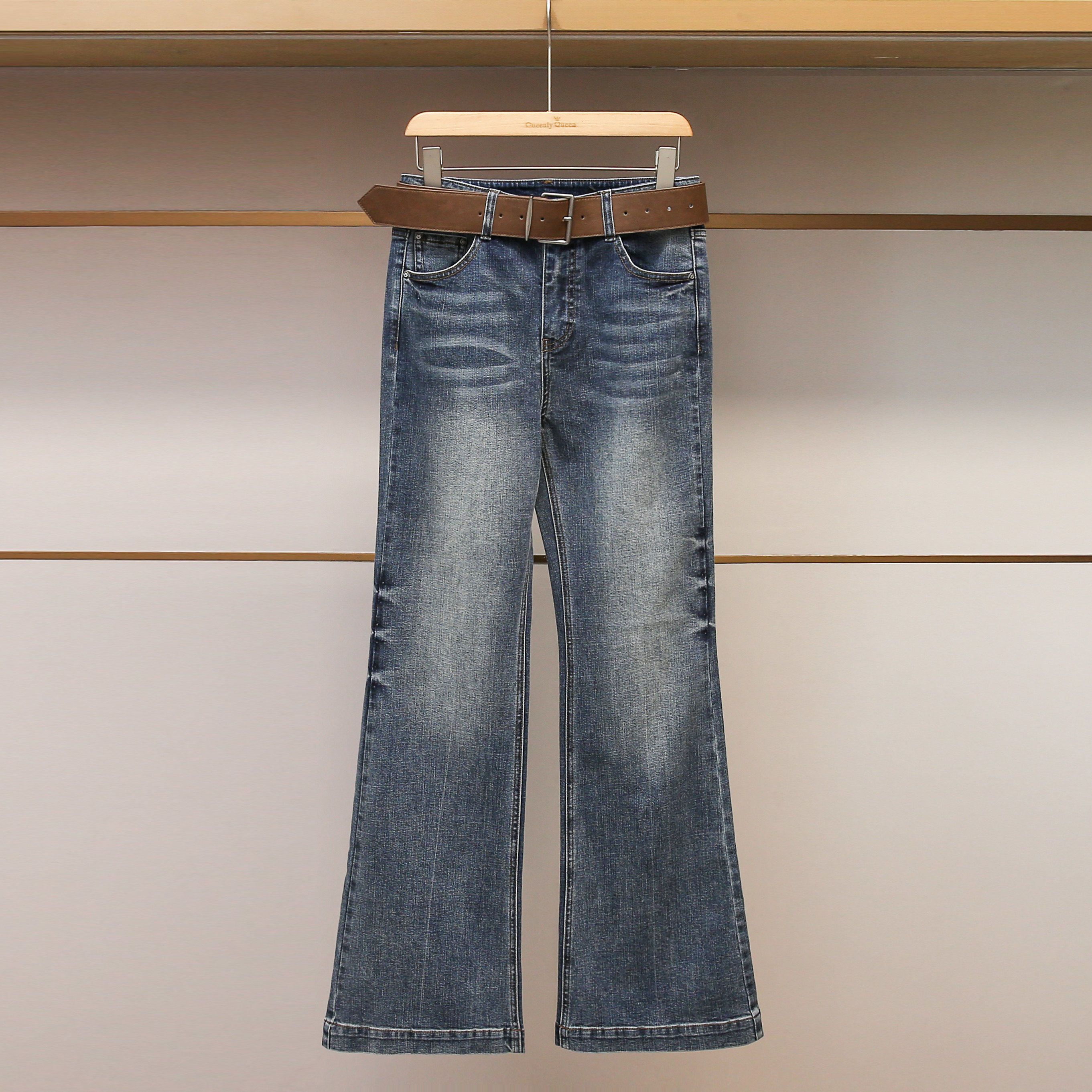 深圳南油高端女装2025冬季新款复古百搭休闲竹节纹微喇裤牛仔长裤