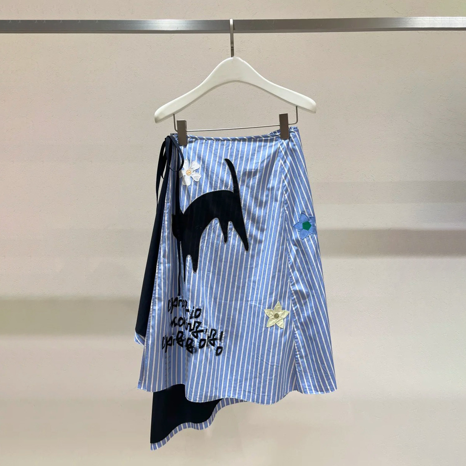 深圳南油高端女装2026春季新款印花条纹不对称设计感百搭半身裙女,女装/女士精品,半身裙,淘宝优惠券,粉丝福利购,淘宝优惠卷