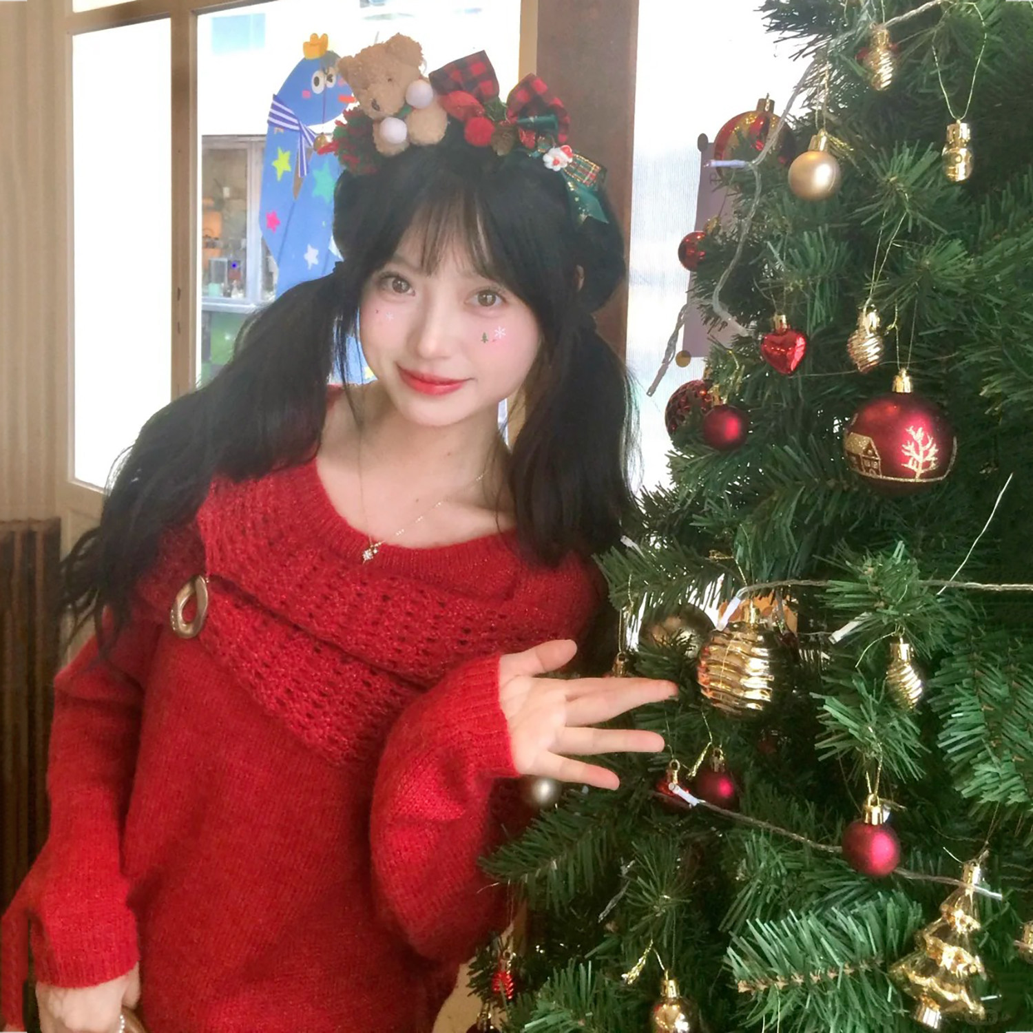 深圳南油高端女装2026春季新款甜美可爱风披肩设计感软糯针织衫女