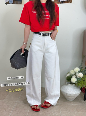 8919春夏新款韩版气质百搭显瘦口袋字母压花染色弯刀裤休闲牛仔裤