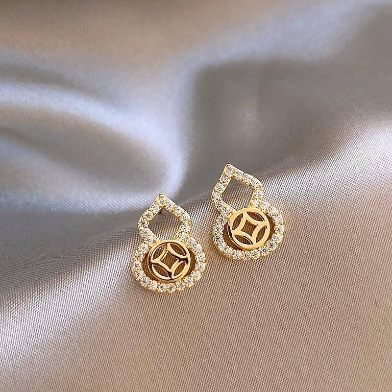 真金电镀银针镶锆石葫芦镂空耳钉