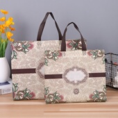 黄色花纹覆膜无纺布礼品袋女装 店手提袋超大购物袋定制印logo 服装