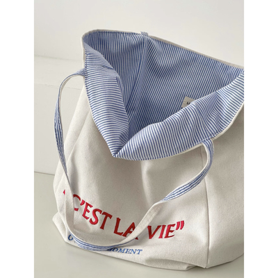 春夏新韩版两面可备清新蓝白条纹大学生百搭休闲减龄少女帆布包