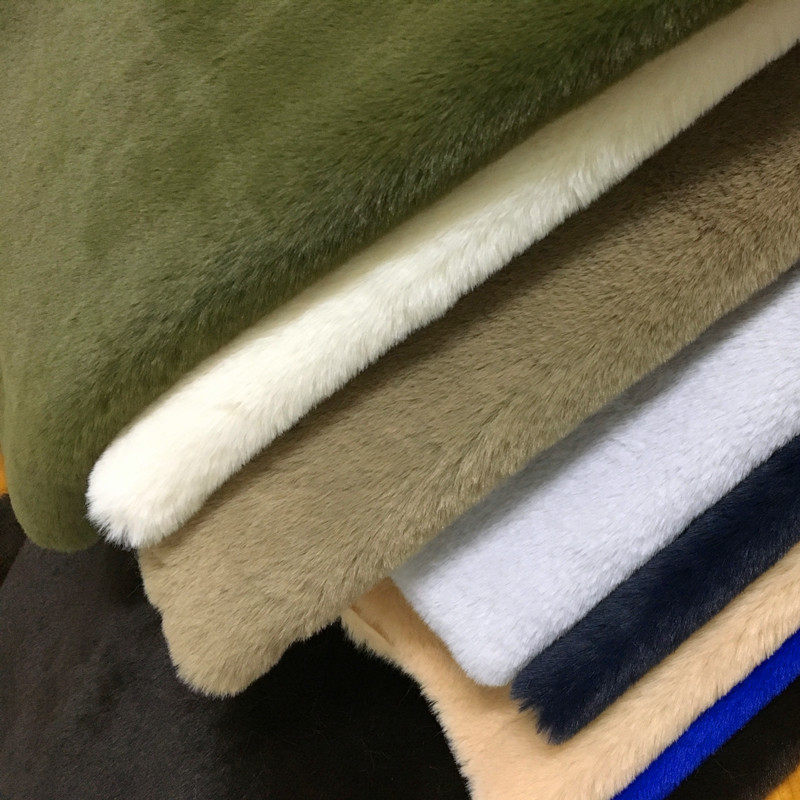 仿獭兔毛皮草面料长毛绒服装布料加密加厚柜台展示背景公仔面料