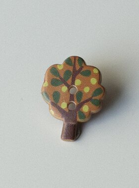 棕色底色黄绿果子果树纽扣