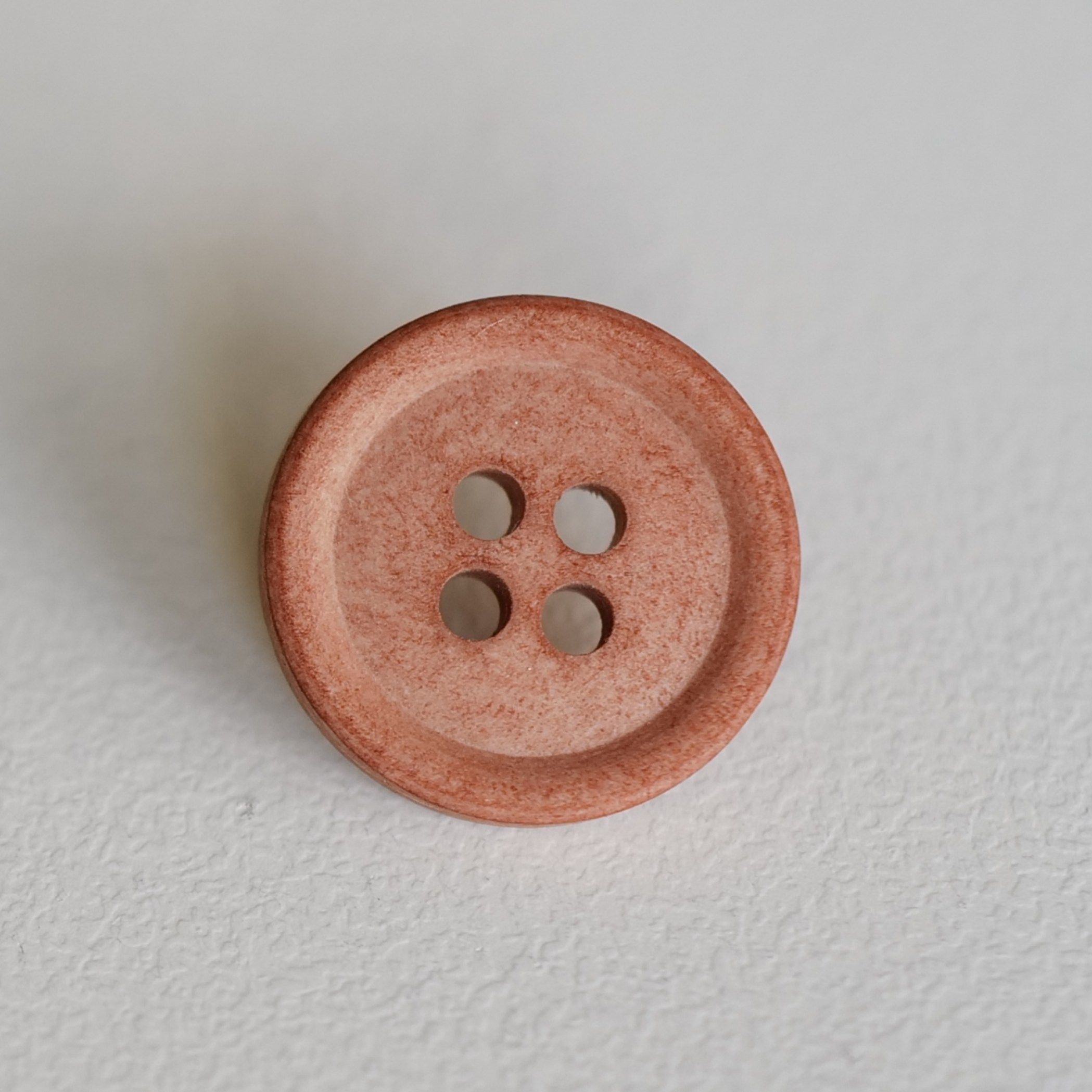 棉主成分锈棕橘色纽扣